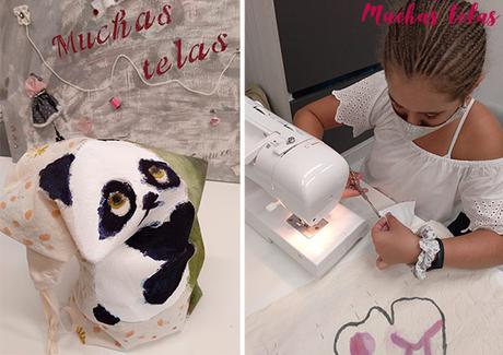 Tela pintada y niña cosiendo