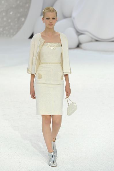 A model walks the runway during the Chanel Ready to Wear Spring / Summer 2012 show during Paris Fashion Week at Grand Palais on October 4, 2011 in Paris, France.