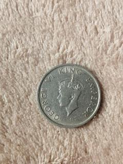 Tres monedas de Jorge VI de Inglaterra