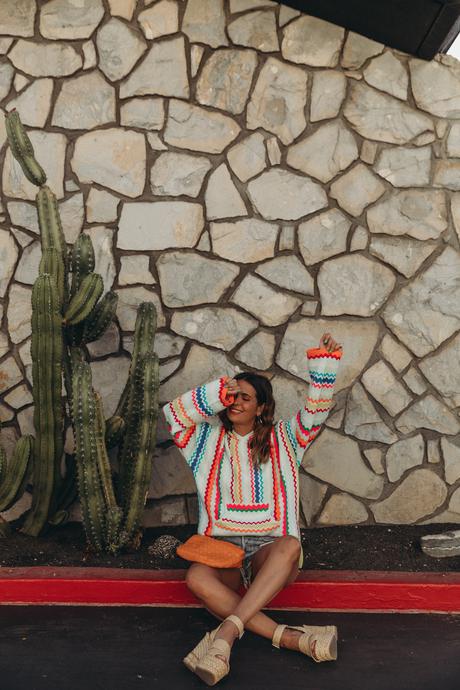 Collage Vintage wearing a festival look from Kujten cashmere collection