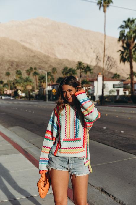 Collage Vintage wearing a festival look from Kujten cashmere collection