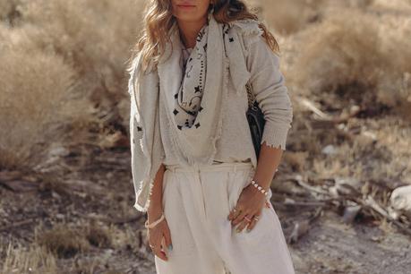 Collage Vintage wearing a festival look from Kujten cashmere collection