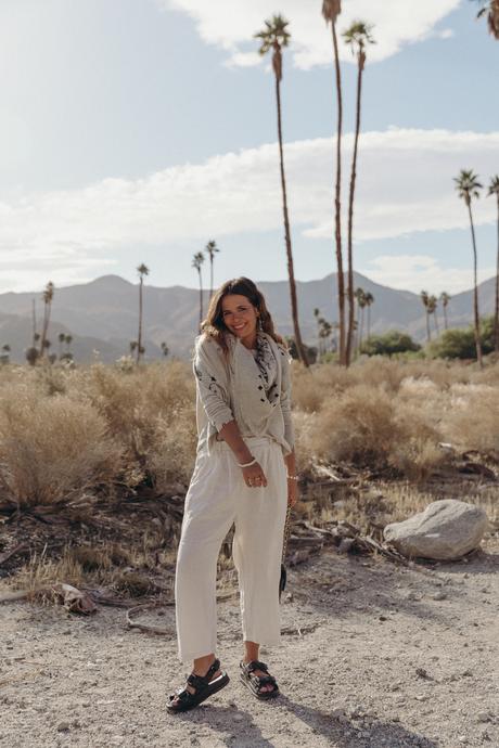 Collage Vintage wearing a festival look from Kujten cashmere collection