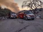 Autoridades combaten incendio en el basurero de El Zapote