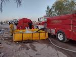 Autoridades combaten incendio en el basurero de El Zapote