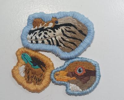 Los bordados dinosaurianos de Small Microraptor Los bordados dinosaurianos de Small Microraptor