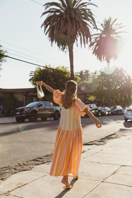 Sara from Collage Vintage wearing a Stine Goya summer dress, Zara yellow sandals and By Far bag