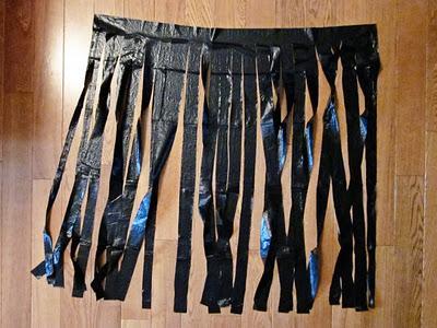HACER UNA CORTINA PARA HALLOWEEN cortina bolsa de basura