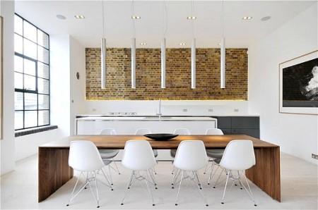 sillas eames muro caravista muebles de diseño grandes ventanales estilo nórdico estilo minimalista estilo londinense entrevisa decoesfera delikatissen diseño de interiores decoración en blanco decoración de interiores cocina moderna cocina blanca cama tatami apartamento de diseño en londres 