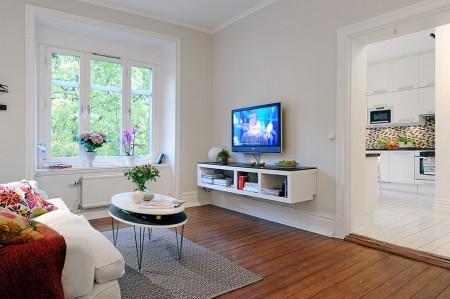 suelo de madera blanco papel de pared de pajaritos papel de pared muebles de diseño mosaico en la cocina estilo nórdico diseño de interiores decoración sueca decoración en tonos pastel decoración en blanco decoración de interiores cocinas modernas cocinas blancas apartamento de diseño sueco 