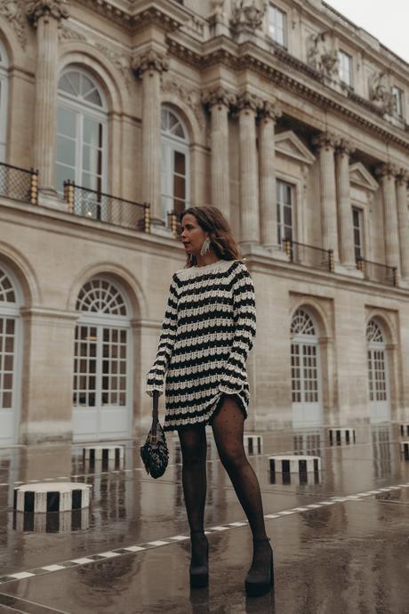 Sara from Collage Vintage at Paris Fashion Week. Wearing a striped knit long sweater, Fendi vintage bag and platform sandals.