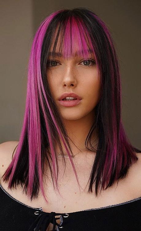 black and pink hair color, medium haircut with two tone hair color, medium haircut with bangs, black and pink hair color