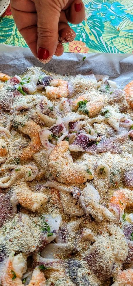 Calamares y langostinos rebozados al horno