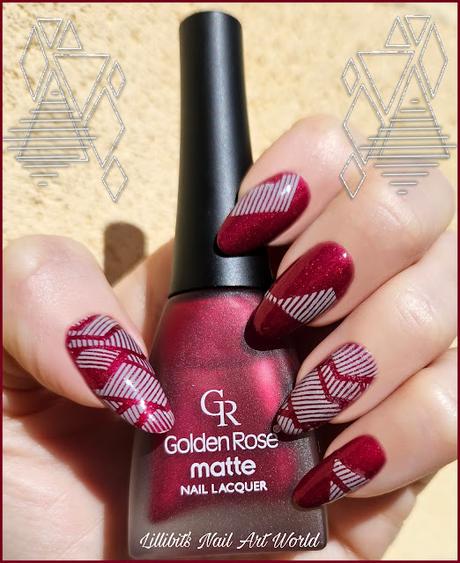 Manicura granate con geometría gris