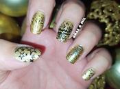 Diseño uñas dorado negro para