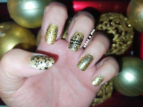 Diseño de uñas en dorado y negro para Fin de Año