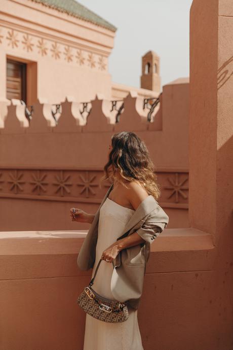 Sara from Collage Vintage wearing a sequin dress, a blazer and a Fendi bag at Marrakech