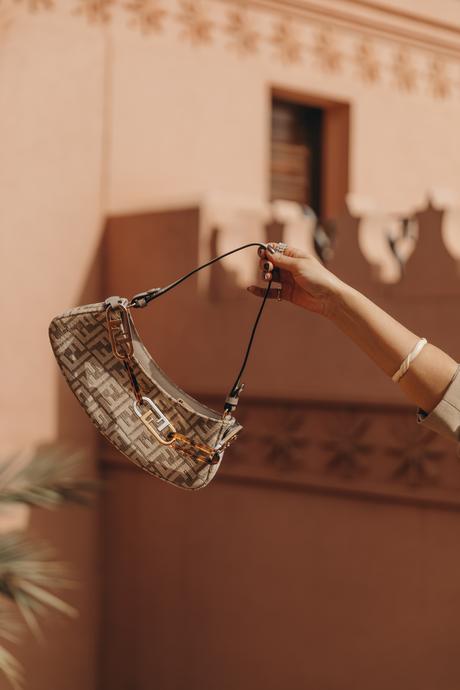 Sara from Collage Vintage wearing a sequin dress, a blazer and a Fendi bag at Marrakech