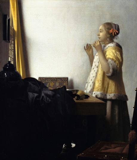 Luz sobre Vermeer Dama joven con collar de perlas Vermeer