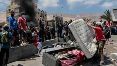 Queman viviendas de migrantes venezolanos y haitianos en México