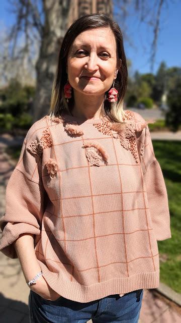 Jersey y vaqueros outfit