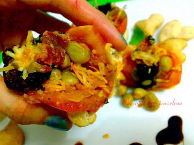 Flores de tomate y habitas tiernas