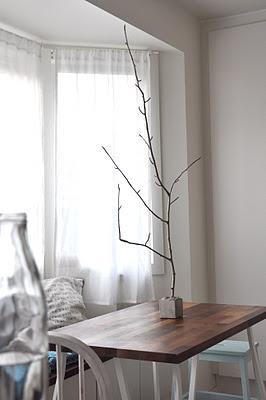 DIY: Árbol de Navidad con una rama y una base de cemento