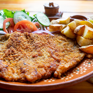 Historia detrás de la Escalopa Milanesa: ¡Una Delicia con Historia! Historia detrás de la Escalopa Milanesa: ¡Una Delicia con Historia!