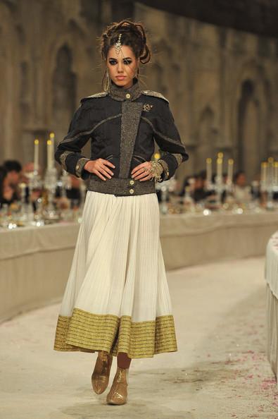 Model Amber Le Bon walks down the runway during the Chanel Paris-Bombay Show at Grand Palais on December 6, 2011 in Paris, France.