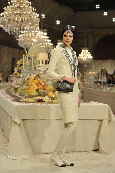 A model walks down the runway during the Chanel Paris-Bombay Show at Grand Palais on December 6, 2011 in Paris, France.