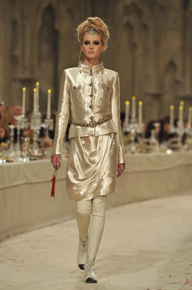 A model walks down the runway during the Chanel Paris-Bombay Show at Grand Palais on December 6, 2011 in Paris, France.