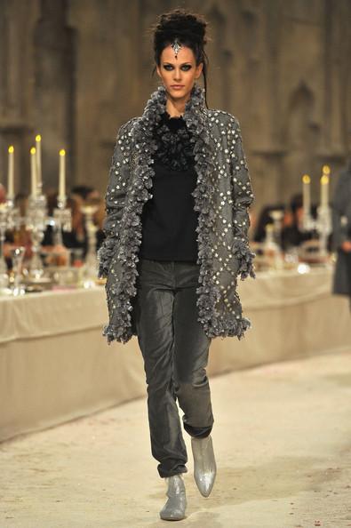 A model walks down the runway during the Chanel Paris-Bombay Show at Grand Palais on December 6, 2011 in Paris, France.