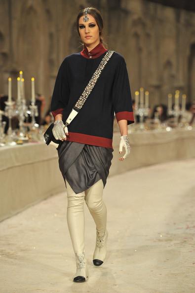 A model walks down the runway during the Chanel Paris-Bombay Show at Grand Palais on December 6, 2011 in Paris, France.