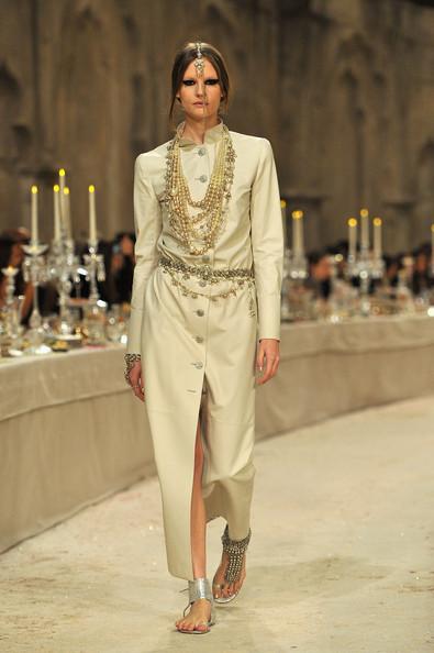 A model walks down the runway during the Chanel Paris-Bombay Show at Grand Palais on December 6, 2011 in Paris, France.