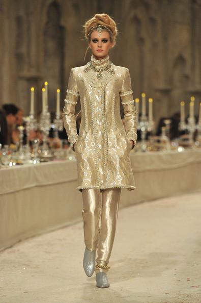 A model walks down the runway during the Chanel Paris-Bombay Show at Grand Palais on December 6, 2011 in Paris, France.