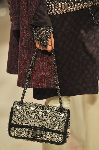 A detail of a model is seen as she walks the runway during the Chanel Paris-Bombay Show at Grand Palais on December 6, 2011 in Paris, France.