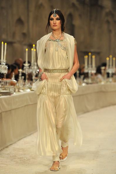 A model walks down the runway during the Chanel Paris-Bombay Show at Grand Palais on December 6, 2011 in Paris, France.