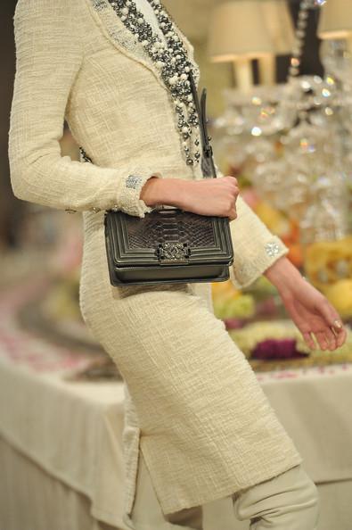 A detail of a model is seen as she walks the runway during the Chanel Paris-Bombay Show at Grand Palais on December 6, 2011 in Paris, France.