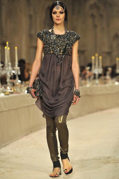 A model walks down the runway during the Chanel Paris-Bombay Show at Grand Palais on December 6, 2011 in Paris, France.