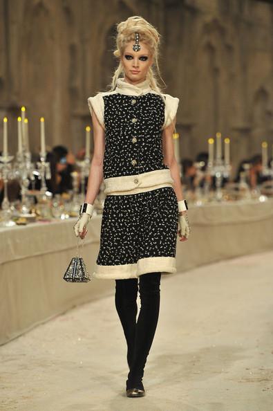 A model walks down the runway during the Chanel Paris-Bombay Show at Grand Palais on December 6, 2011 in Paris, France.