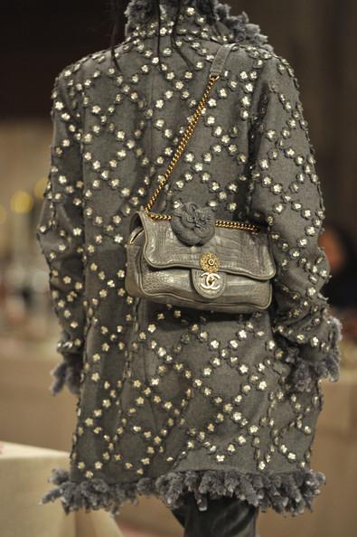 A detail of a model is seen as she walks the runway during the Chanel Paris-Bombay Show at Grand Palais on December 6, 2011 in Paris, France.