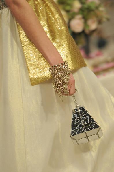 A detail of a model is seen as she walks the runway during the Chanel Paris-Bombay Show at Grand Palais on December 6, 2011 in Paris, France.