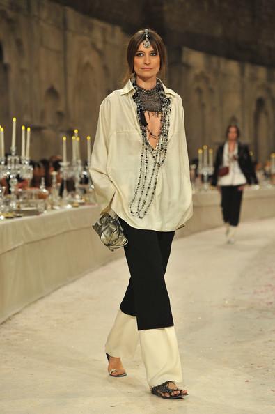 Model Caroline de Maigret walks down the runway during the Chanel Paris-Bombay Show at Grand Palais on December 6, 2011 in Paris, France.