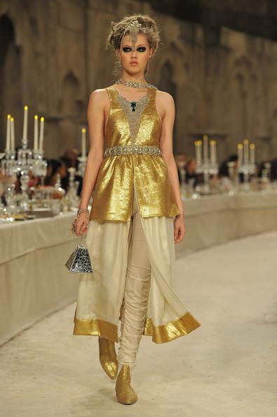 A model walks down the runway during the Chanel Paris-Bombay Show at Grand Palais on December 6, 2011 in Paris, France.