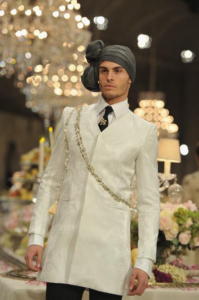 Model Baptiste Giabiconi walks down the runway during the Chanel Paris-Bombay Show at Grand Palais on December 6, 2011 in Paris, France.