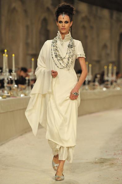 A model walks down the runway during the Chanel Paris-Bombay Show at Grand Palais on December 6, 2011 in Paris, France.