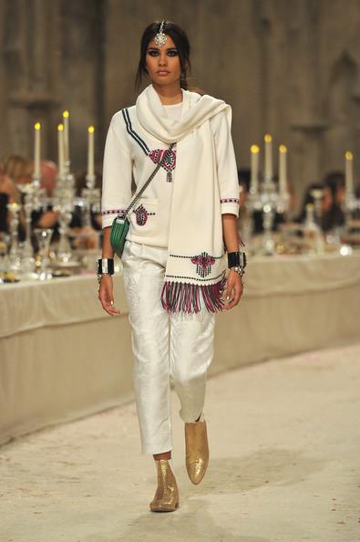 A model walks down the runway during the Chanel Paris-Bombay Show at Grand Palais on December 6, 2011 in Paris, France.