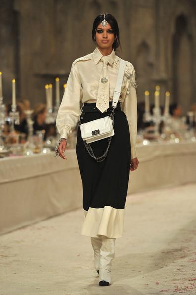 A model walks down the runway during the Chanel Paris-Bombay Show at Grand Palais on December 6, 2011 in Paris, France.