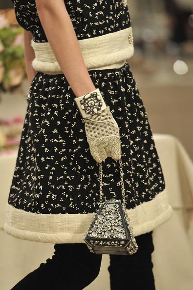 A detail of a model is seen as she walks the runway during the Chanel Paris-Bombay Show at Grand Palais on December 6, 2011 in Paris, France.