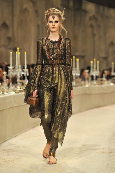 A model walks down the runway during the Chanel Paris-Bombay Show at Grand Palais on December 6, 2011 in Paris, France.